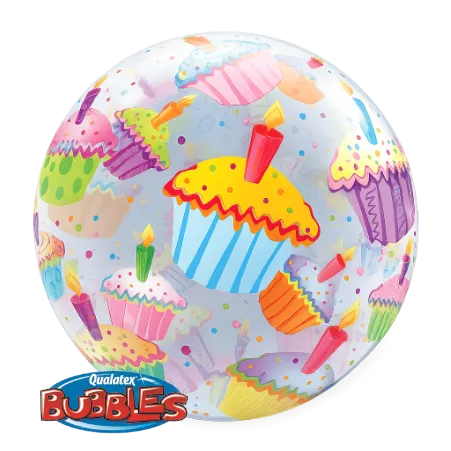 Transparenter Bubbles Ballon mit bunten Cupcakes, Kerzen und Konfetti